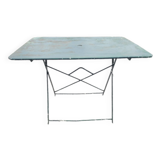 Old folding iron garden table