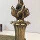 Pair of Empire Period Chenets in Chiselled Bronze with Torches and Leaf Frieze