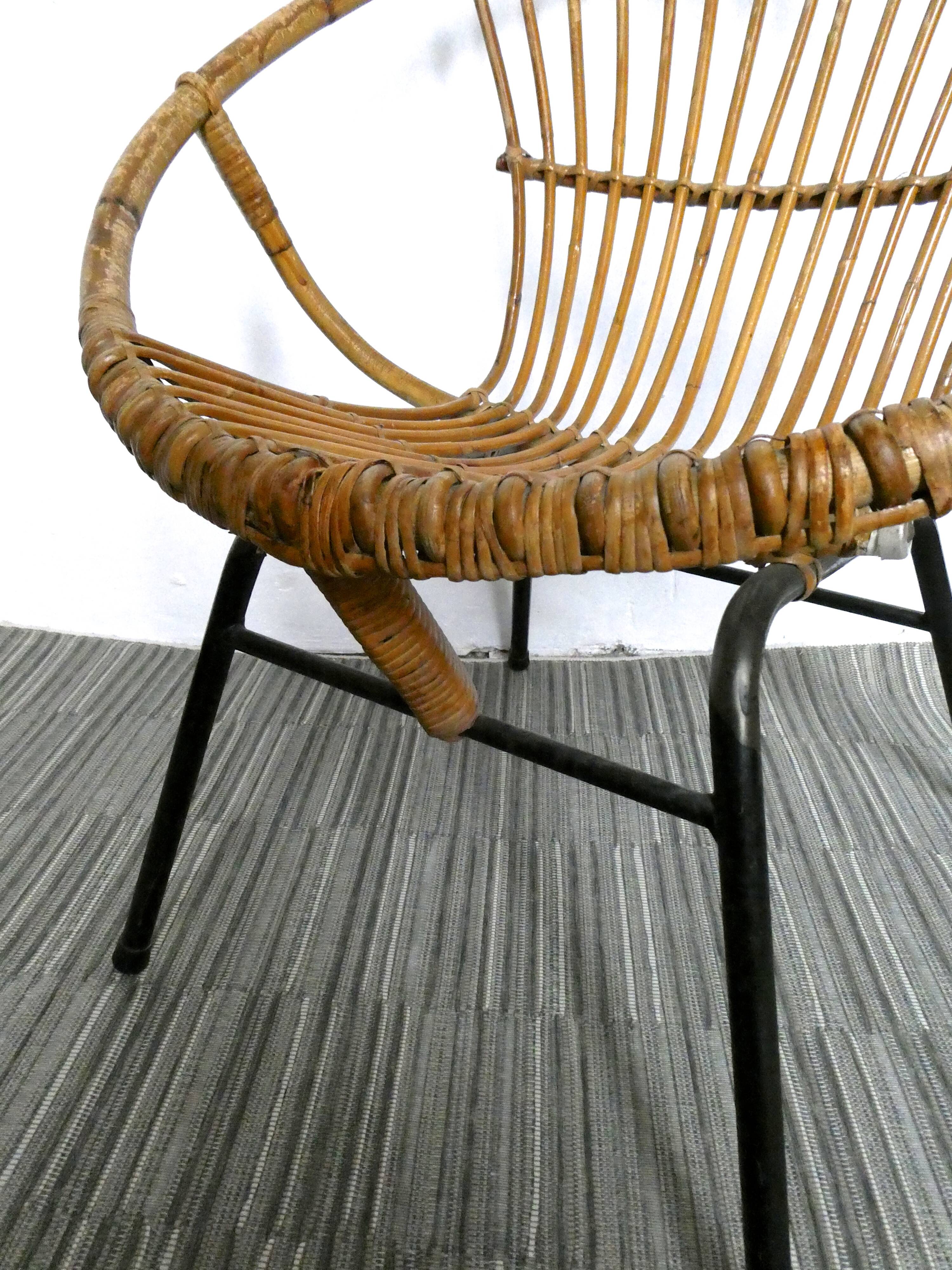 Rattan armchair and 1960s metal feet