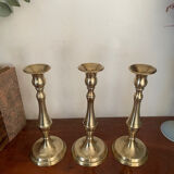 Set of three vintage brass candlesticks