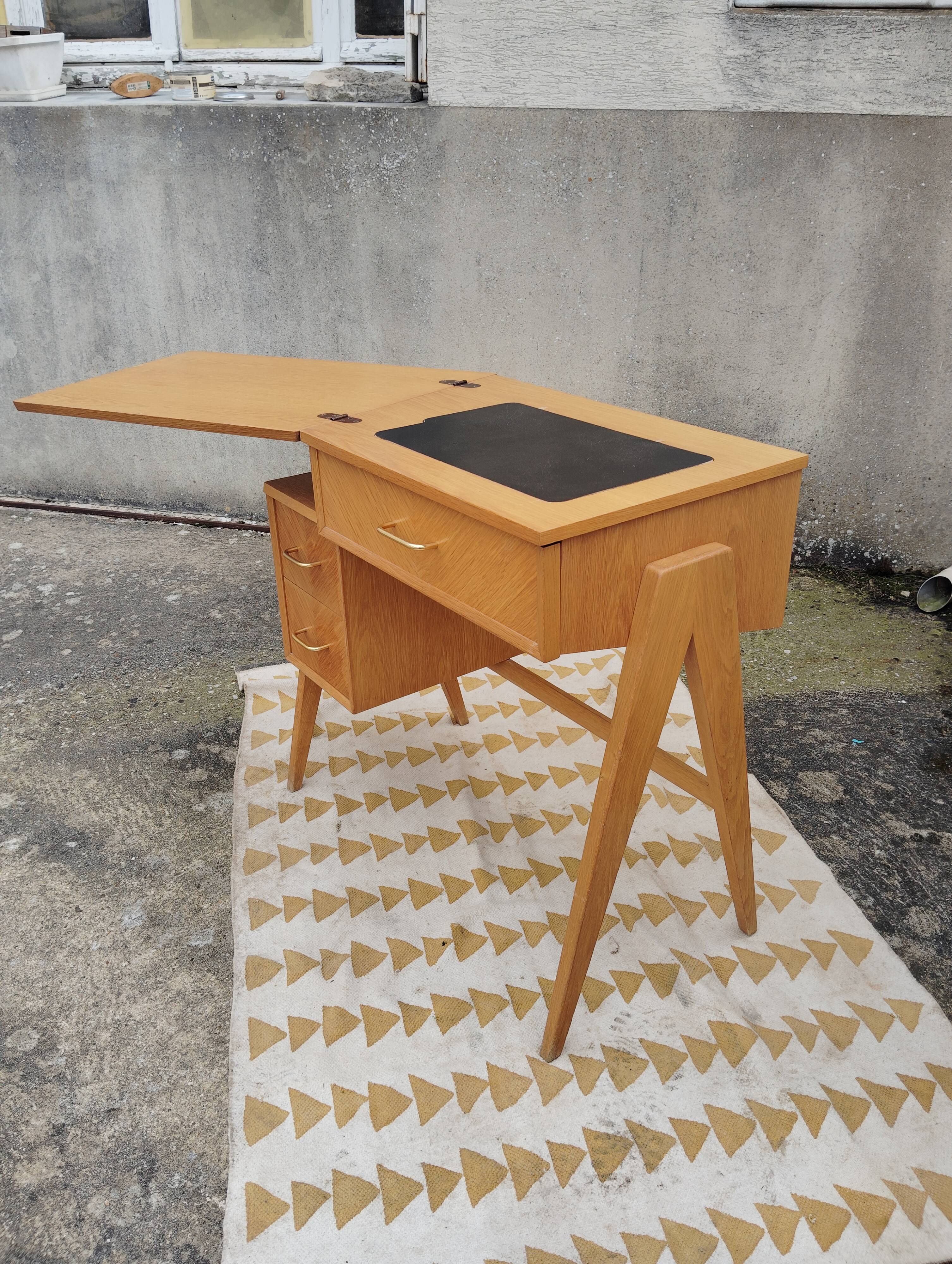 Scandinavian desk based on a Singer piece of furniture.