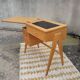 Scandinavian desk based on a Singer piece of furniture.