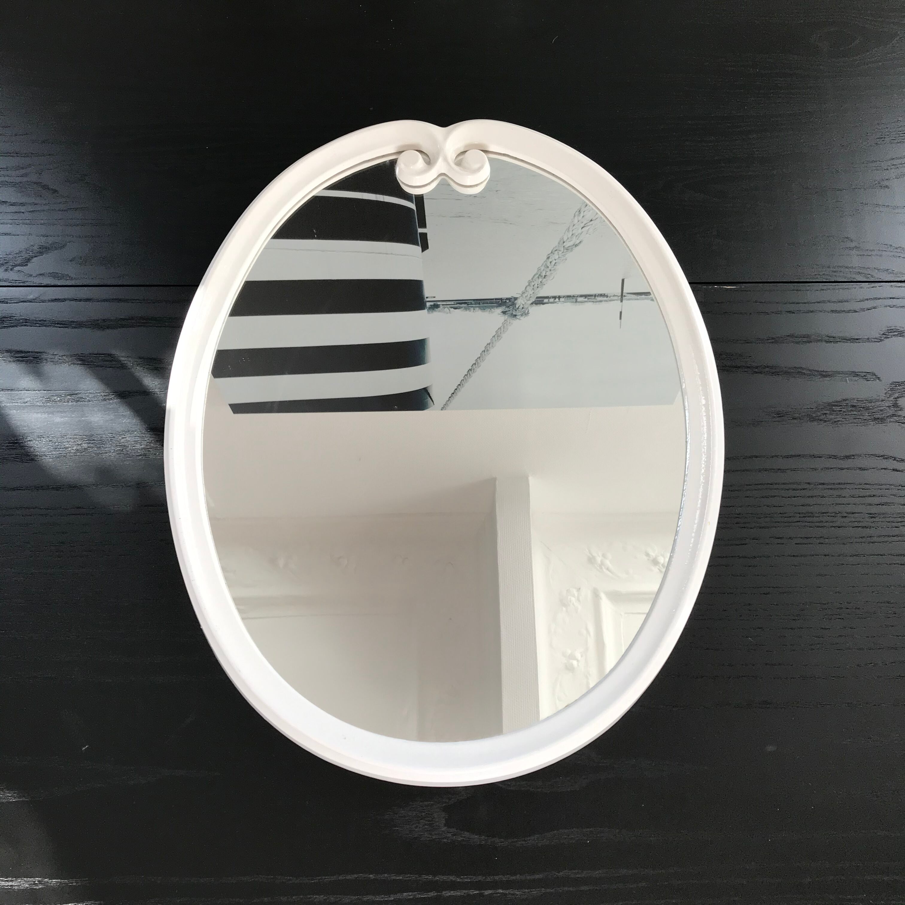 White metal oval mirror 49x39cm