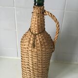 Set of 2glass bottles covered with wicker or rattan