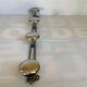 Chromed metal coat rack with four hooks