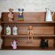 Old wall shelf in raw wood