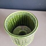 Green glazed ceramic flowerpot on stand