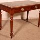 flat desk with two drawers from the 19th century in mahogany and inlays
