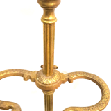 Old brass umbrella door triangular base mounted on column