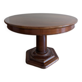 Table ronde à pied central extensible