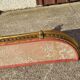 Old bed canopy in yellow copper and bronze