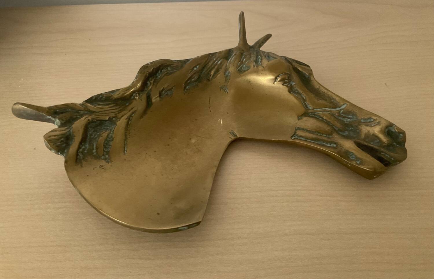 Vintage bronze horse pocket emptier