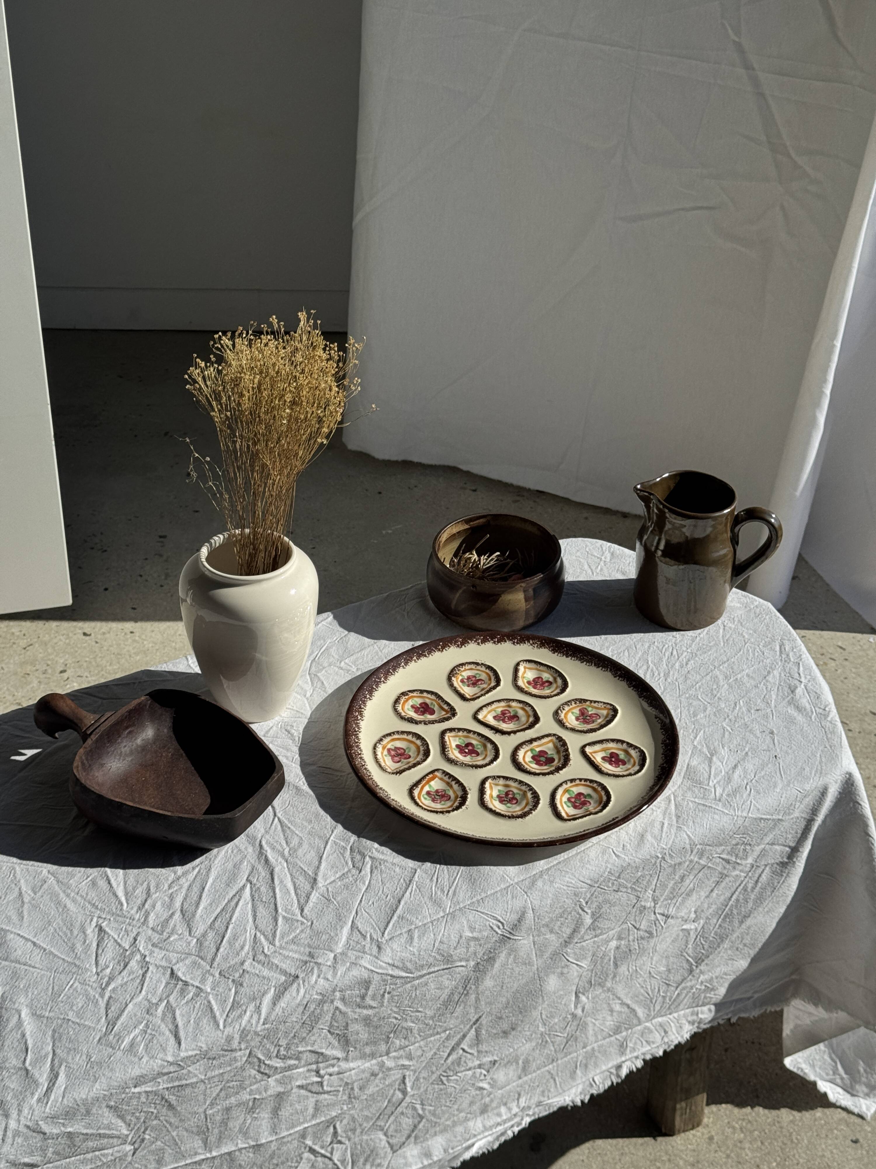 Large circular platter with compartments for shellfish, molluscs, and oysters.