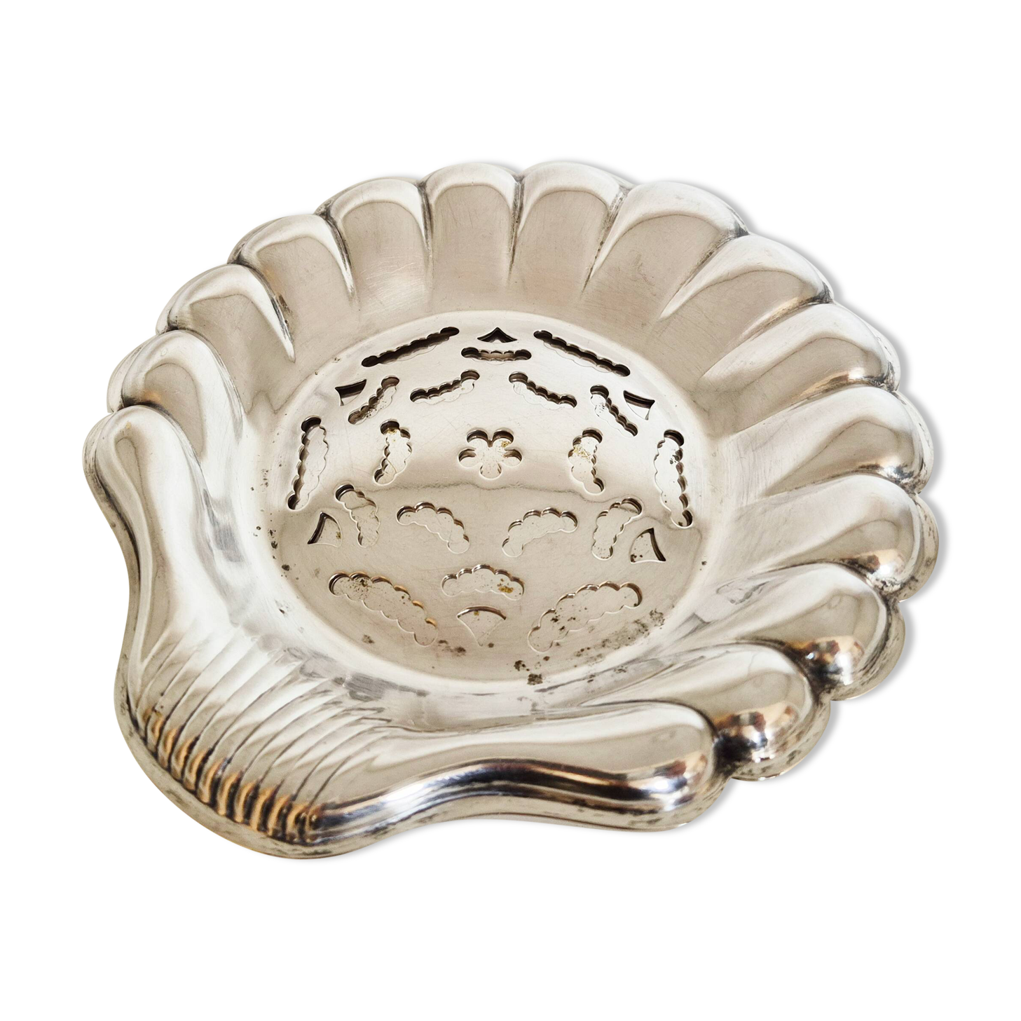 Silver scallop shell butter dish.