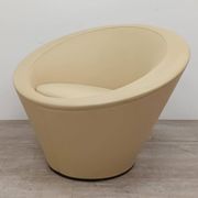Girola armchair from Tacchini in beige leather.