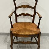 Provencal style straw armchair sometimes called marsh armchair