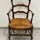 Provencal style straw armchair sometimes called marsh armchair