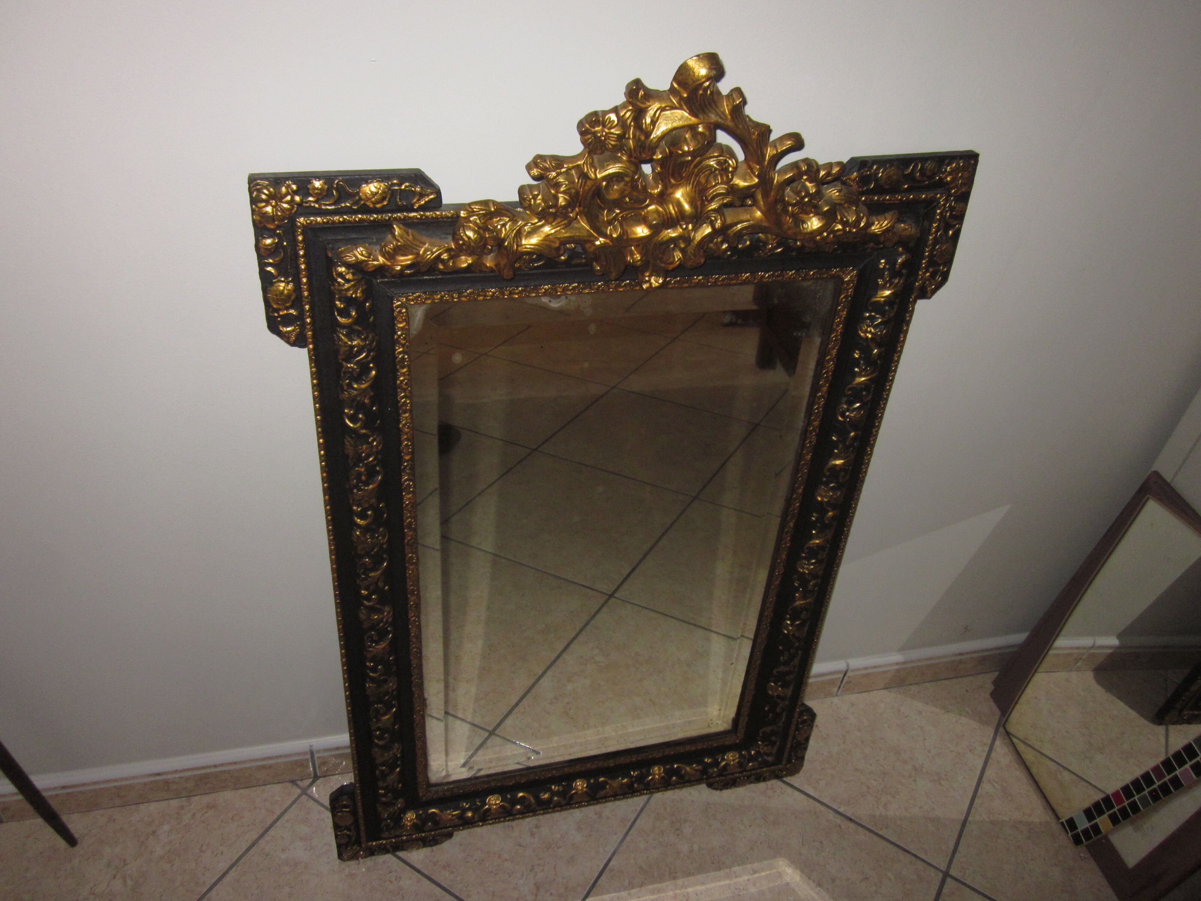 Old mirror with pediment