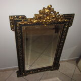 Old mirror with pediment