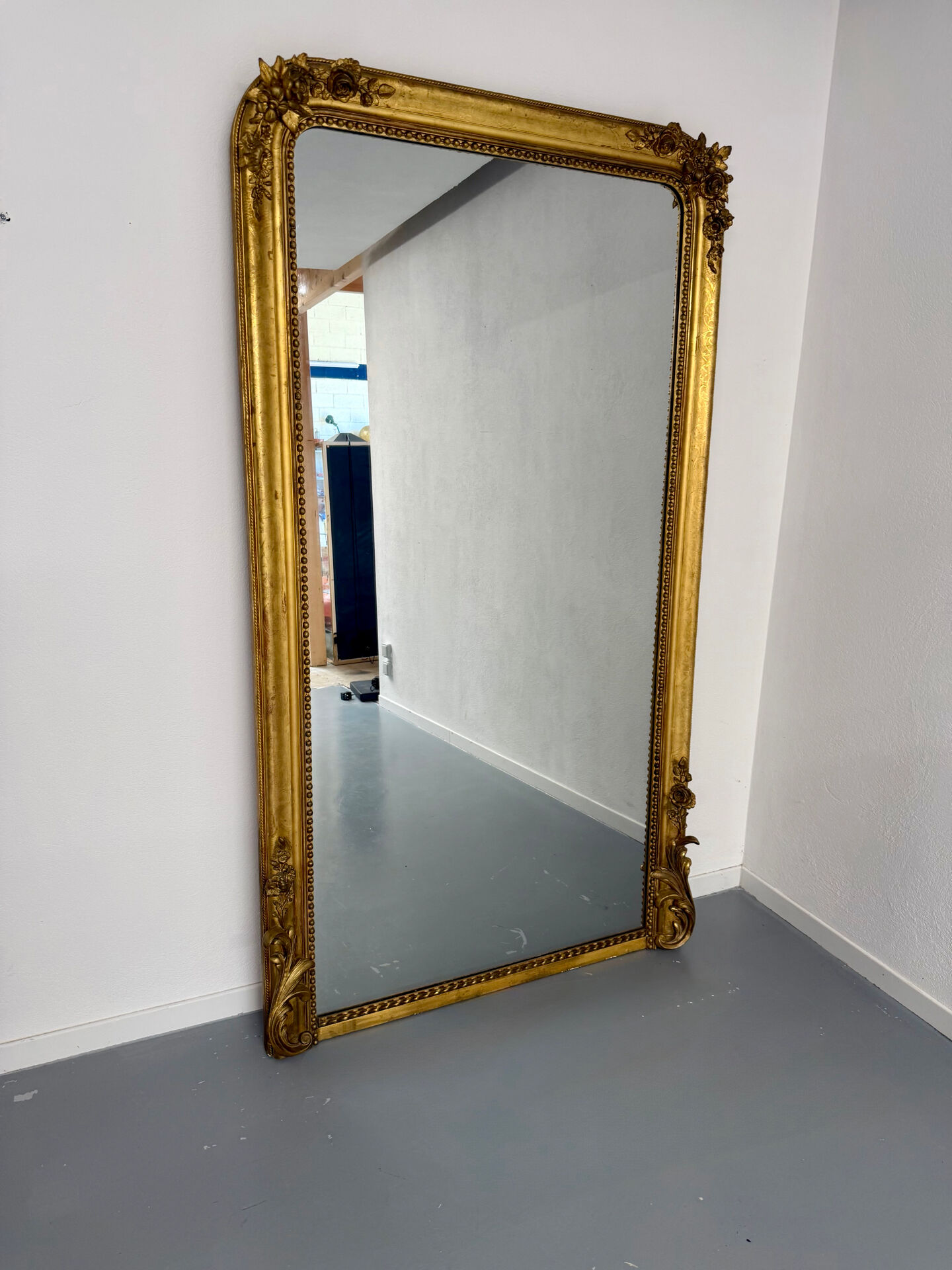 Large Napoleon III mirror with wooden gilded frame, 19th century, 200 cm.