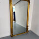 Large Napoleon III mirror with wooden gilded frame, 19th century, 200 cm.