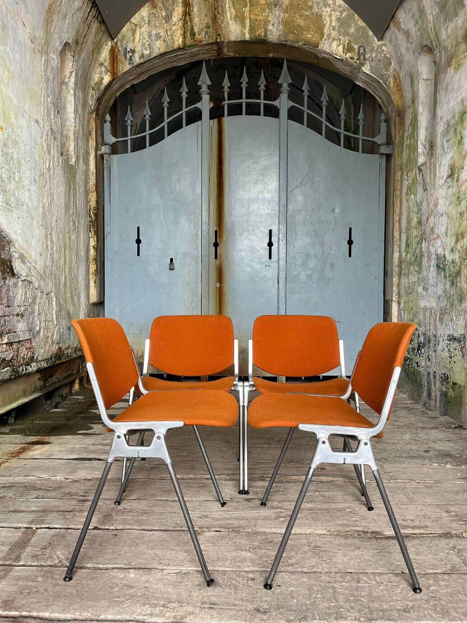 DSC 106 chair in orange by Giancarlo Piretti for Castelli, 1970s.