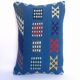 woven velvet cushion, very lively thanks to its bright colours.