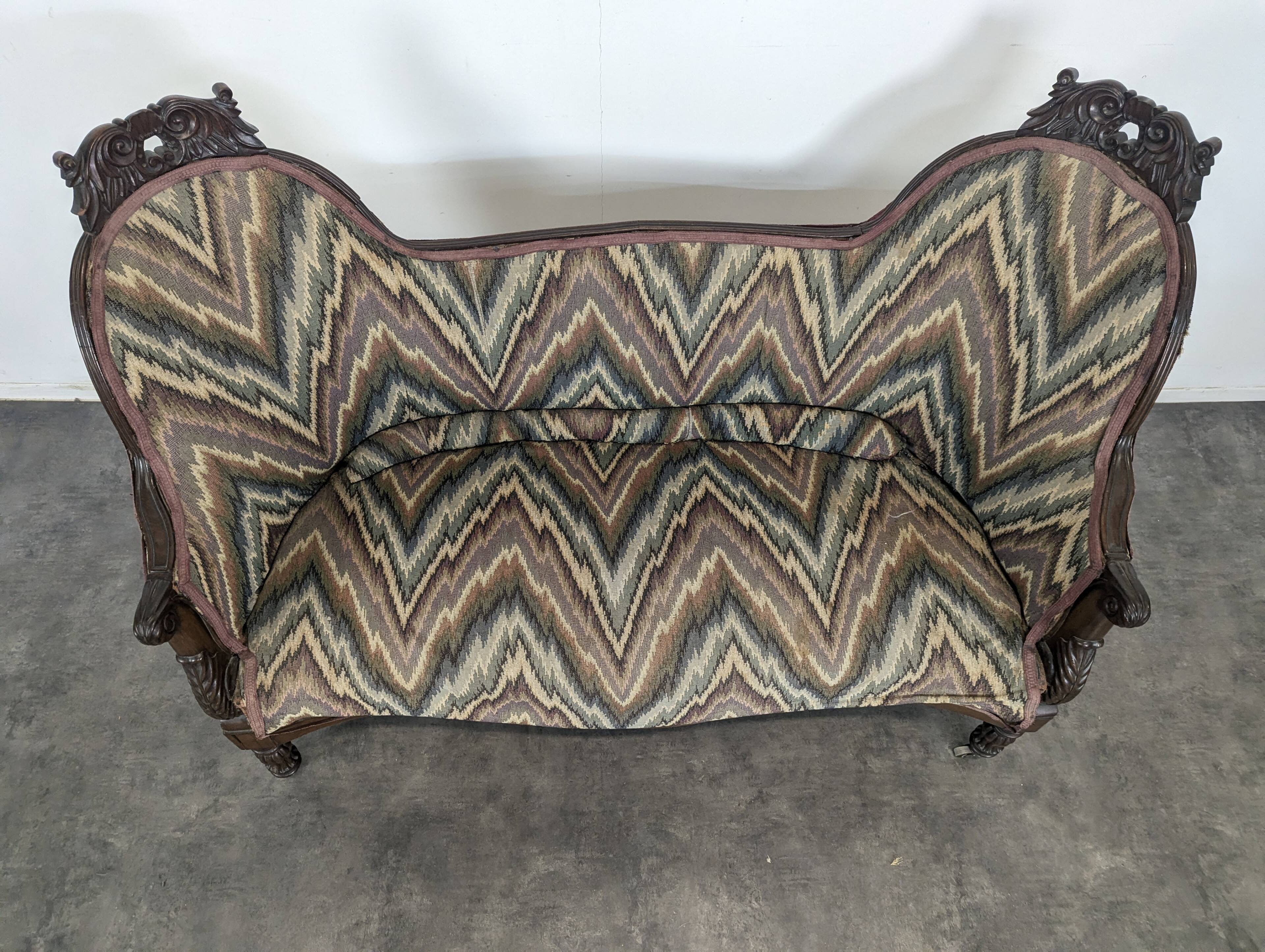 Mahogany banquette sofa in Louis Philippe style.
