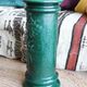 Pedestal column in green ceramic with flower and fruit decoration
