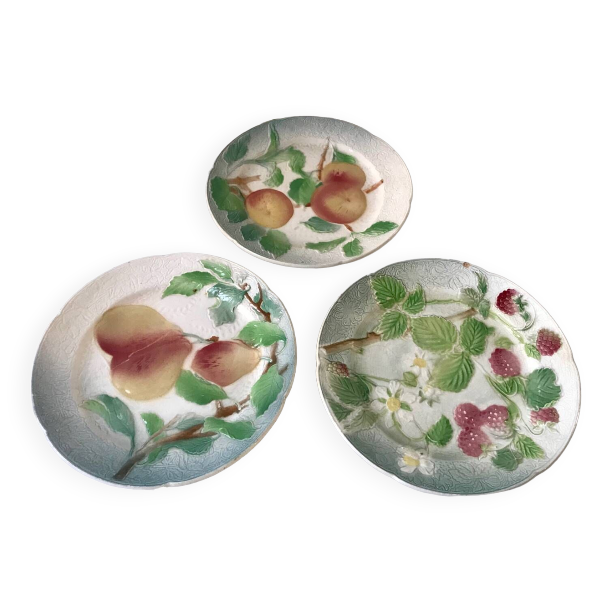 Trio of St Clement dessert plates in 19th century slip