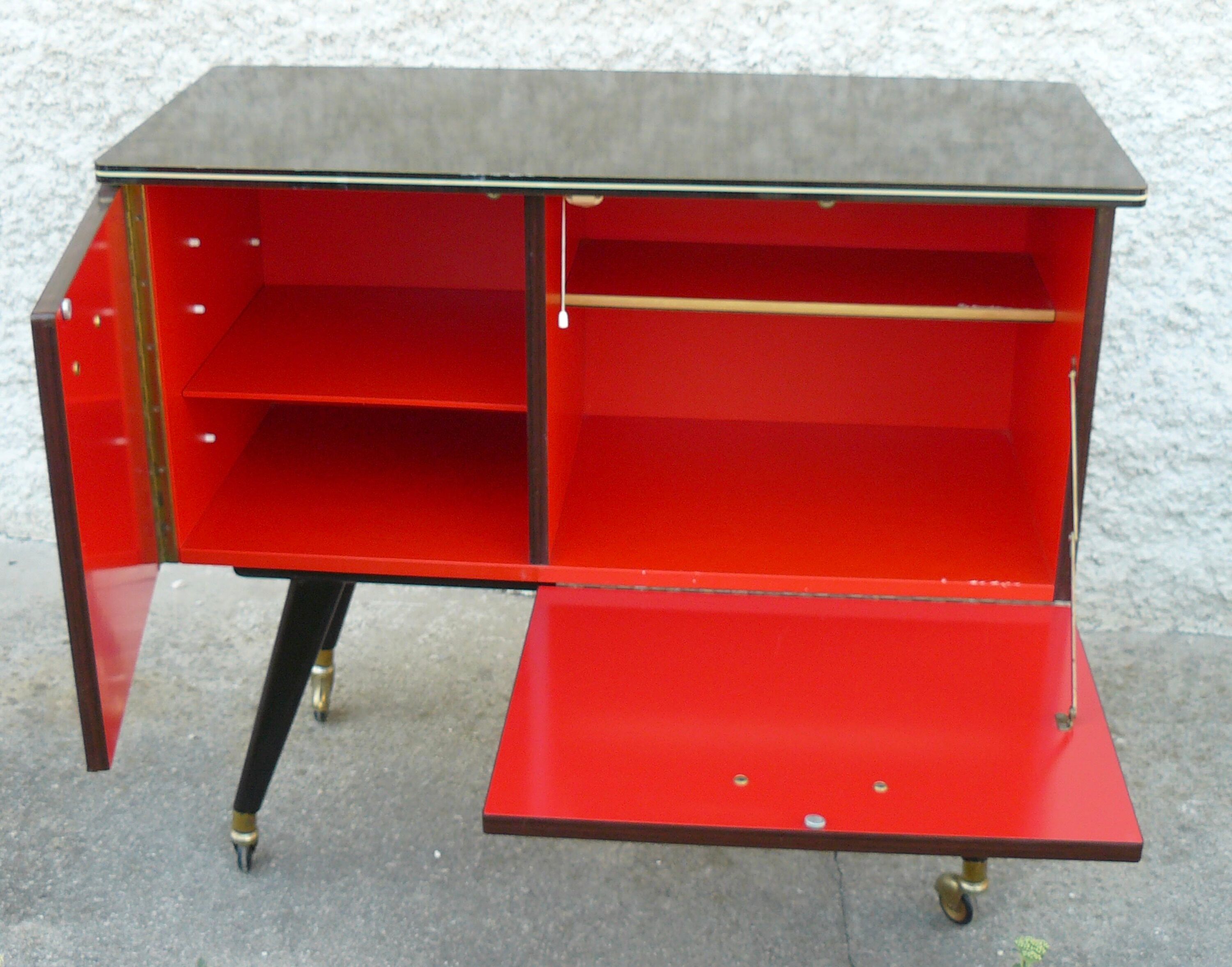 Vintage 1960s rolling and lighting bar with compass legs