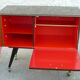 Vintage 1960s rolling and illuminating bar with compass legs.
