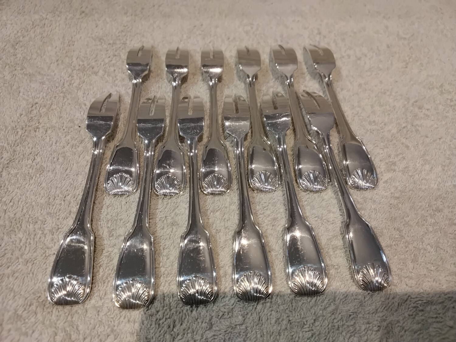 12 silver-plated metal snail forks by silversmith Noel Collet, shell design