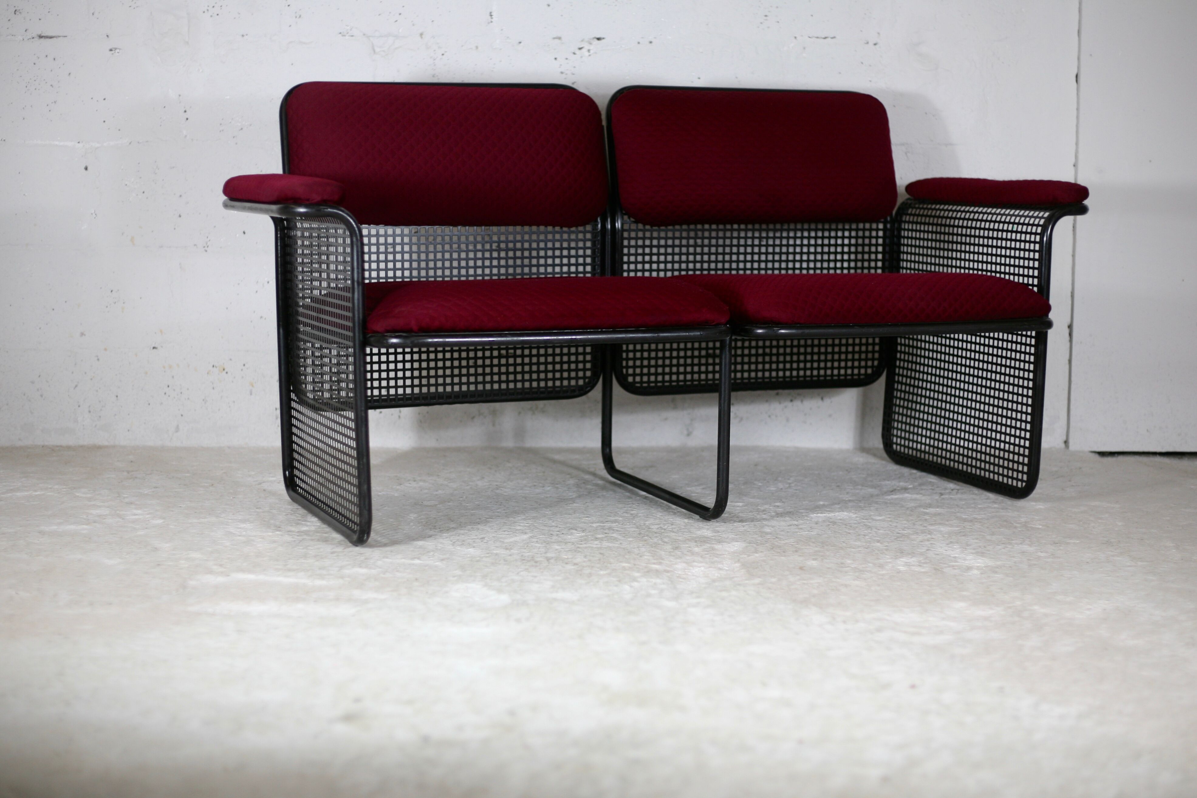 Black honeycomb steel sofa, burgundy fabrics, Italy, circa 1970