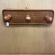 Triple coat rack in brown rattan