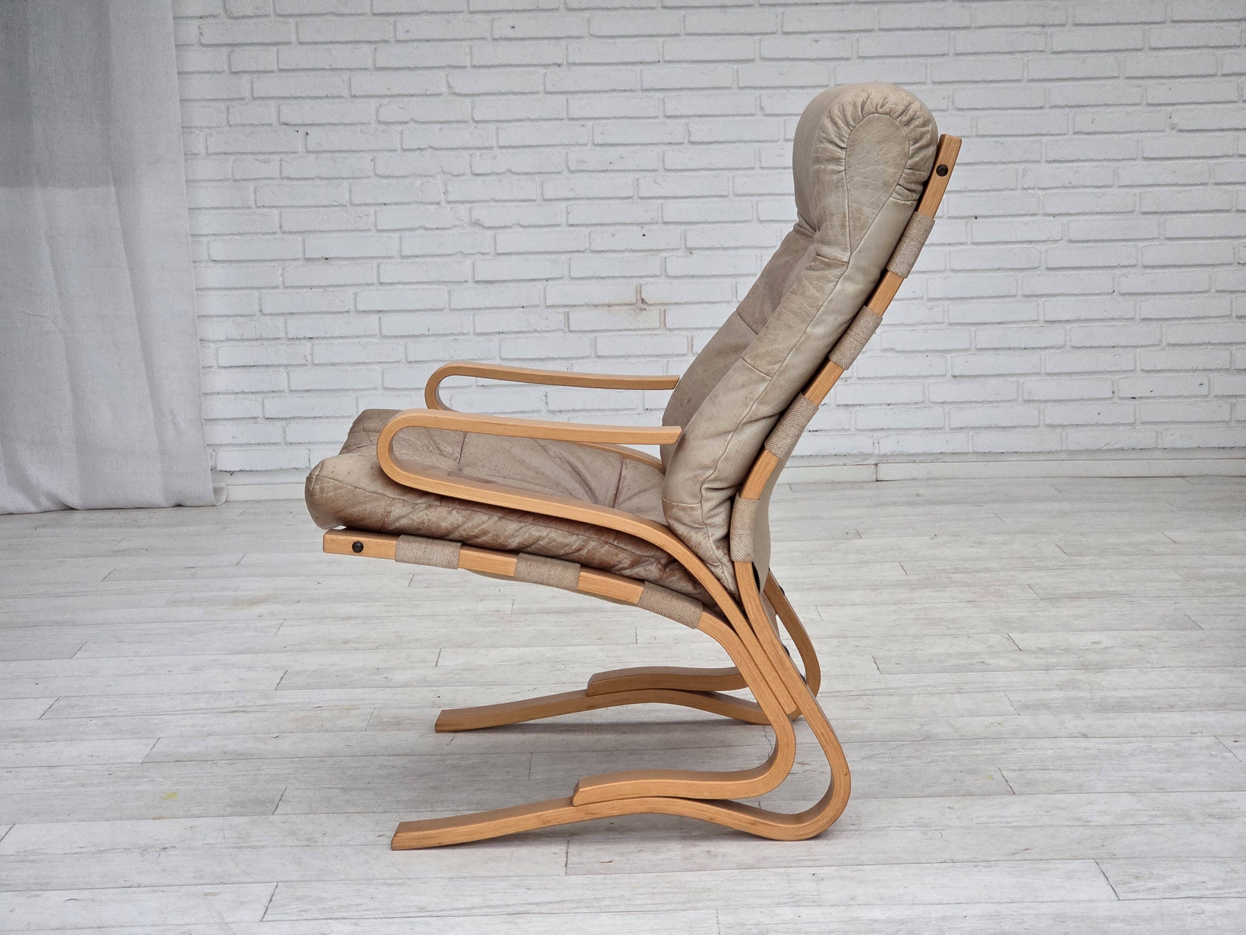 1970s, Norwegian armchair, model "Kengu", beige furniture leather.