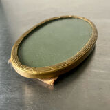 Metal gold colored oval picture frame brass