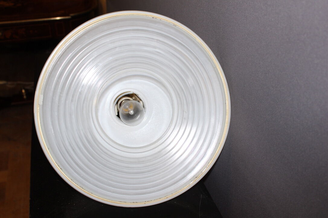 Sheet metal chandelier perforated by holophane circa 1950