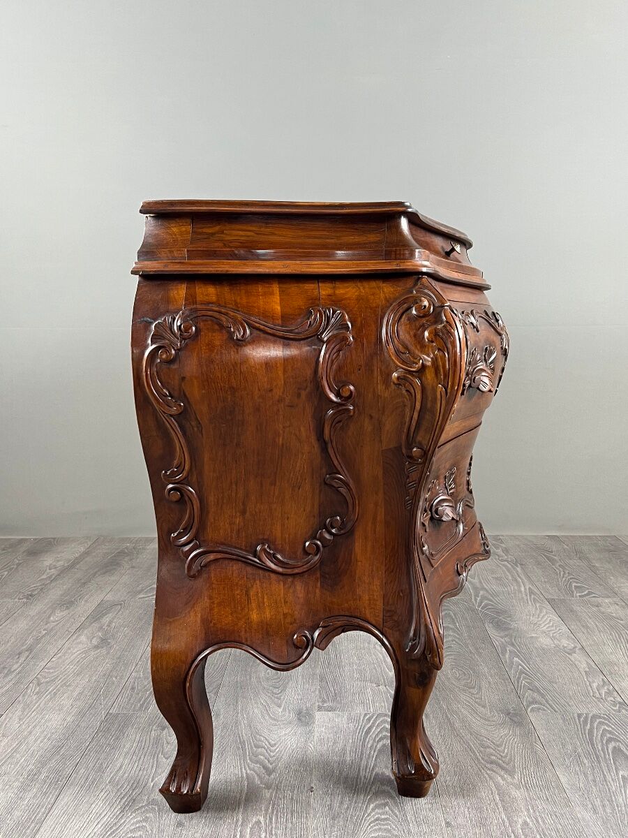 Curved commode in the Louis XV style, carved wood, 19th century.