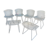 Chairs and footrest by Harry Bertoia