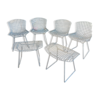 Chairs and footrest by Harry Bertoia