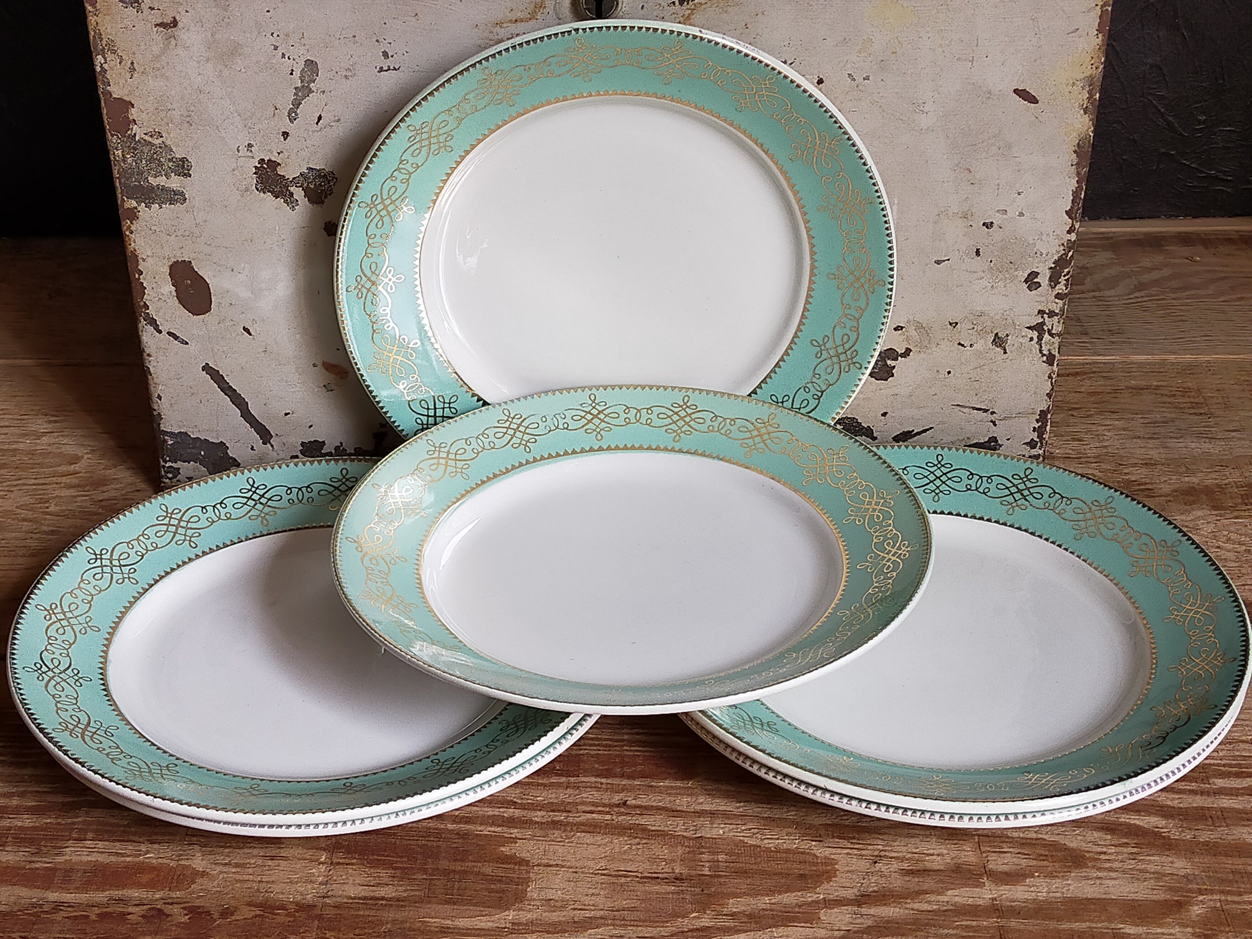 Six plates of vintage Badonviller earthenware with gold frieze