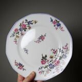 7 assiettes à dessert Bernardaud en porcelaine de Limoges décor floral, années 20-50