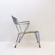Vintage perforated metal armchair from the 1950s.