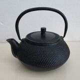 Black cast iron teapot