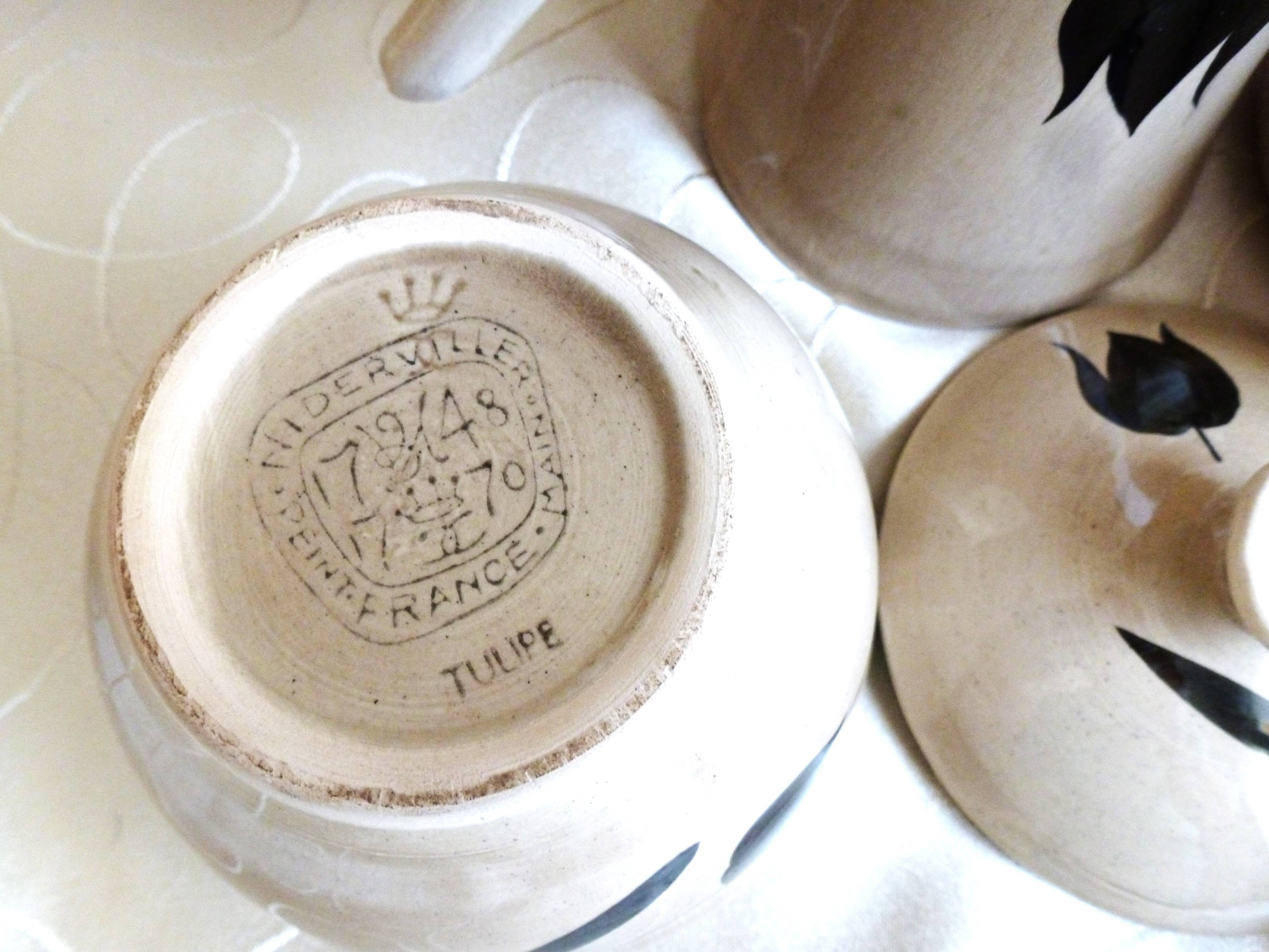 Vintage 23-piece Niderviller coffee set with hand-painted black tulip decor.