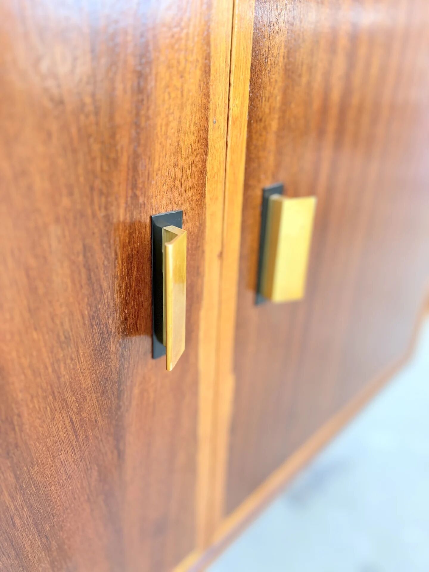 Mahogany library — closed storage and open cubbies, custom-made, 1960s.