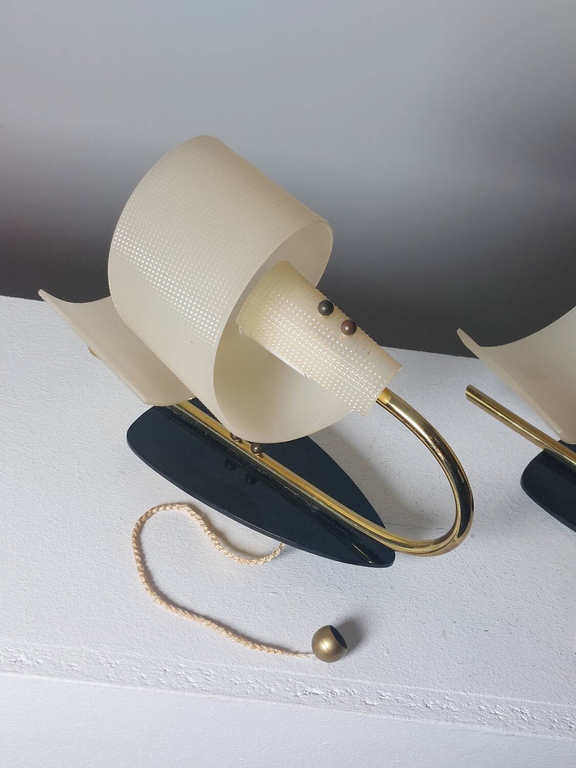 Pair of vintage wall lamps from the 1950s in brass.