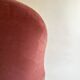 Pink-orange velvet tub chair
