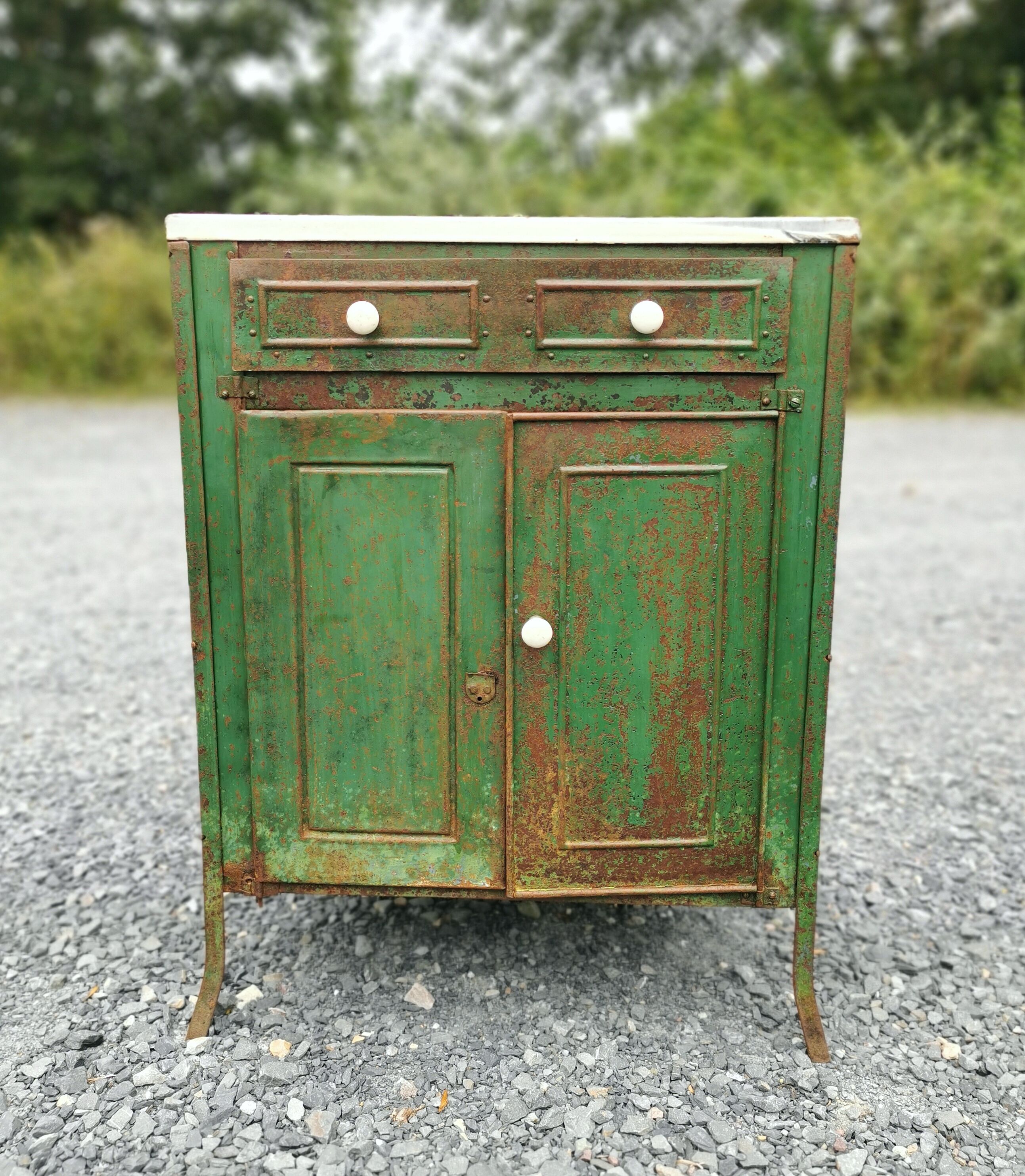 Patinated metal furniture